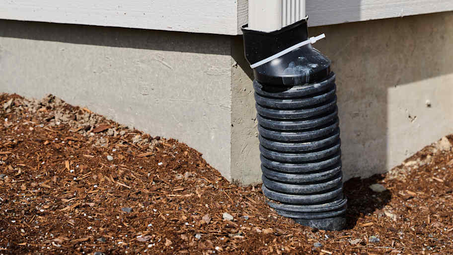 Black corrugated downspout drain extension