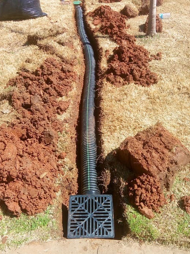 Catch basin connected to corrugated drain pipe