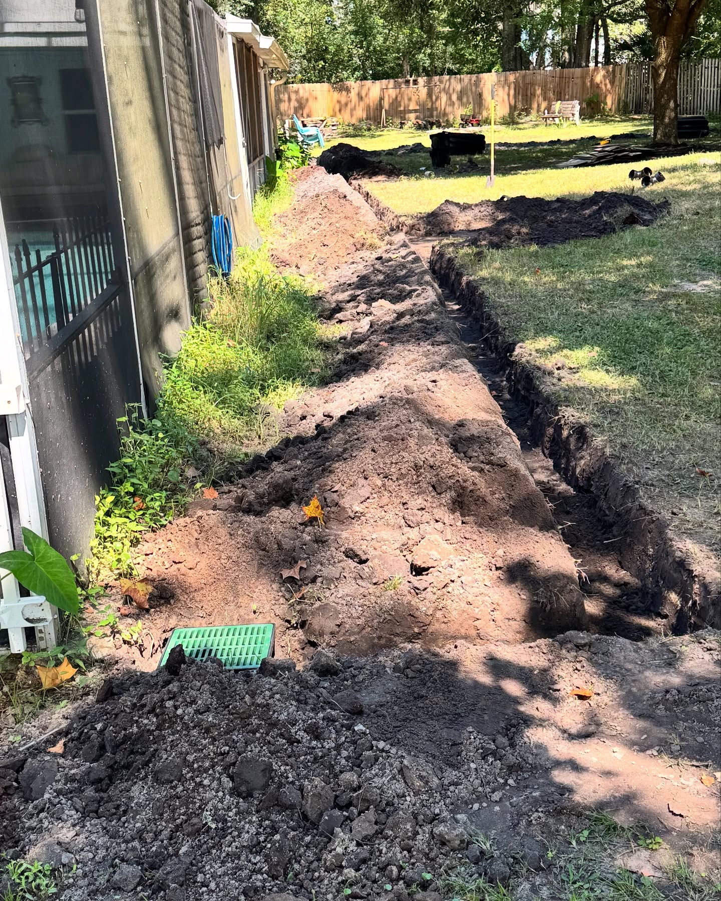Backyard drainage trench excavation